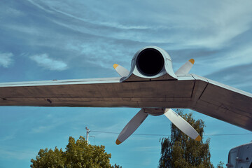 A close-up view of the powerful engine and propeller of a Soviet seaplane, showcasing the aircraft's impressive engineering.