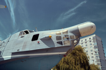 A close-up view of the cockpit of a Soviet seaplane, showcasing its intricate details and weathered...