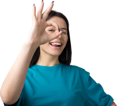 Smiling girl gesturing OK sign with her hand