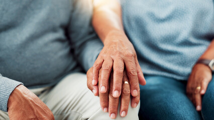 Comfort, empathy and hands of couple in living room of home together for bonding, love or support....