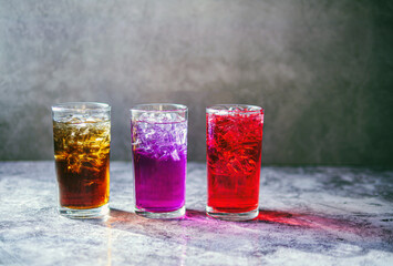 A lot of Soft drinks in colorful and flavorful glasses on the table,Glasses with sweet drinks with...
