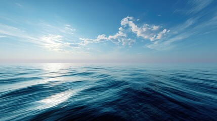 Fototapeta premium Wide open ocean with the horizon gently curving into the distance, under a soft, light blue sky