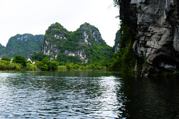 Ninh Binh, Vietnam - July 18, 2022 : Beautiful Natural Landscape In Trang An Landscape Complex Of Ninh Binh Province, Vietnam. Trang An Area Was Designated As A Dual UNESCO World Heritage Site.