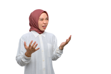 Angry young Asian Muslim woman raising hands and shouting with rage isolated on transparent background