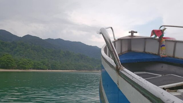 Boat Trip on Blue Lake Mountain Landscape with Cloudy Sky, Serene Nature Journey Through Calm Water 154 characters