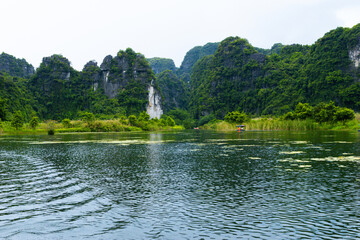 Ninh Binh, Vietnam - July 18, 2022 : Beautiful Natural Landscape In Trang An Landscape Complex Of Ninh Binh Province, Vietnam. Trang An Area Was Designated As A Dual UNESCO World Heritage Site.