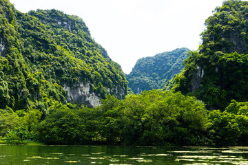 Ninh Binh, Vietnam - July 18, 2022 : Beautiful Natural Landscape In Trang An Landscape Complex Of Ninh Binh Province, Vietnam. Trang An Area Was Designated As A Dual UNESCO World Heritage Site.