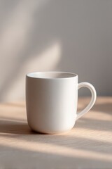 new white coffee mug with  dad ever printed in bold sits empty on minimalist wooden desk