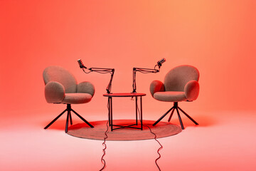 Podcast setting with two chairs and microphones designed for engaging interviews and educational discussions