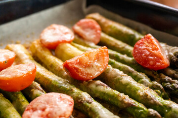 asparagus with tomatoes and cheese. diet. food concept