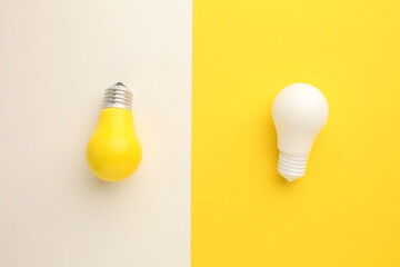 Business creativity and inspiration concepts with lightbulb and pencil on yellow background....