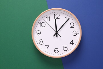 Close-up of a wall clock. The concept of time and work time is valuable for life, Alarm clock...