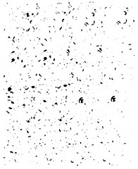 Black specks and splotches scattered randomly on a white background creating a texture