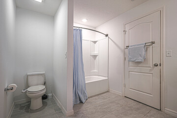  white bathroom empty  with toilet