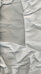 Obraz premium Crumpled White and Gray Paper Texture Background