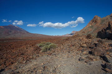 Blue sky with clouds, desert hills and mountain. Nature landscape