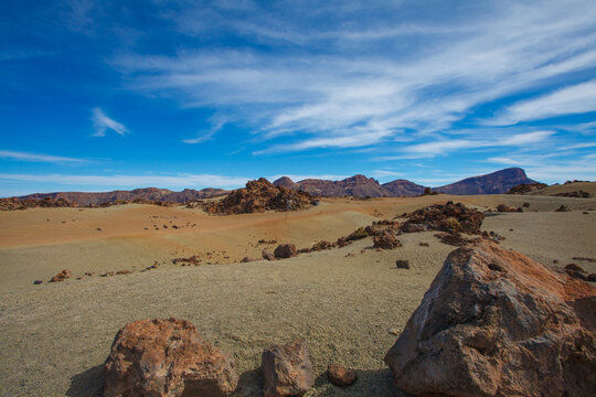 Fototapeta Nature landscape with blue sky, clouds and desert hills