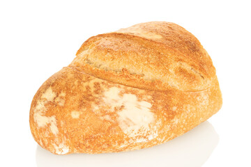 One half of a loaf of bread isolated on a white background, close-up.