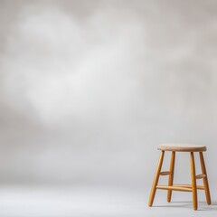 Rustic wooden stool positioned against a textured wall for a stylish and contemporary interior design
