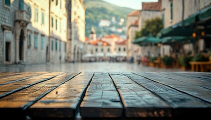 A wooden table with a view of a city street