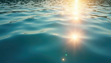 Obraz premium Sparkling sunlight reflecting on a calm body of water , blue, sunny day