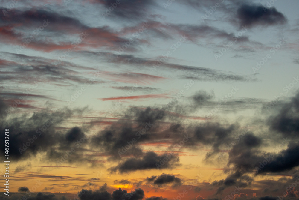 Canvas Prints sky with colorful pink golden and dark clouds at evening twilight. abstract texture background patte