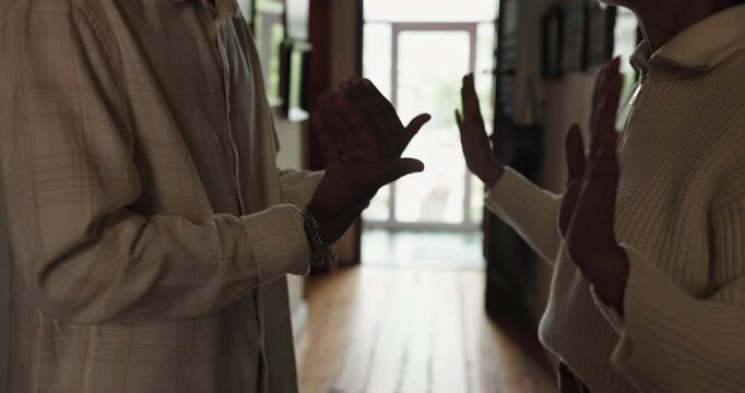 Couple, hallway and hands with argument, stress and drama at home or apartment. Frustrated, woman and man with fight, angry conflict and anxiety with toxic marriage and mistake or crisis with partner