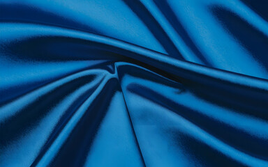 Luxurious and flowing fabric showcasing vibrant blue satin material with graceful waves and elegant textures in studio lighting
