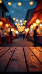 Empty wooden table with twinkling street lights at night market, empty space, festival
