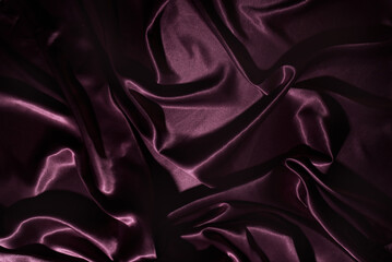 The beautiful wavy purple satin fabric represents charm and love.