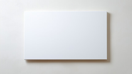 Fototapeta premium 白い壁に白いアートボードの背景