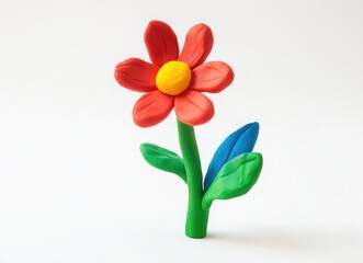 plasticine flower in purple and green, cute clay model top view on white background