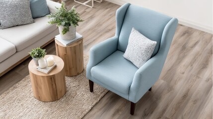Soft blue lounge chair highlighted in a comfortable living room setup with ceramic houseplants and a circular wooden table, creating a cozy atmosphere