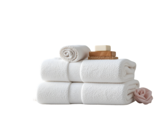 Stack of White Towels with Soap and Flower Decoration