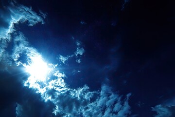 Night sky, sun through clouds