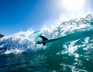 Obraz premium Surfer Riding Turquoise Ocean Wave