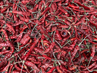 Dried red chilies for making chili powder or seasoning for various dishes. Flat lay background...