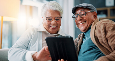Senior couple, tablet and laugh on sofa in home with meme, notification or funny video on web in...