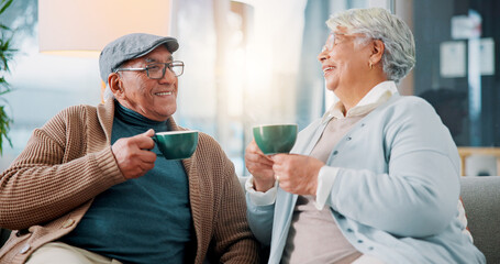 Happy old couple, talking and drinking coffee in home for relax, story and enjoy latte together....