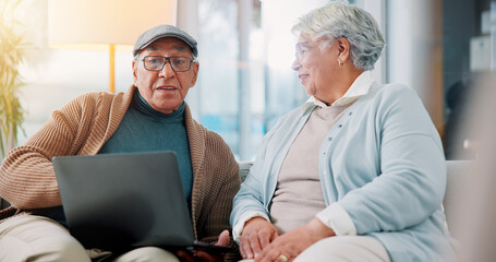 Senior couple, laptop and relax on sofa in home with movie, streaming and laugh at funny video in...