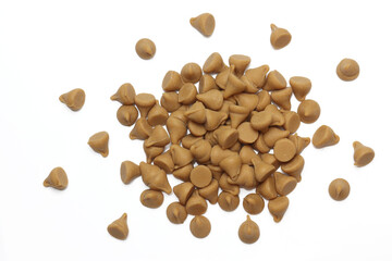 Pile of Butterscotch Chips on white background