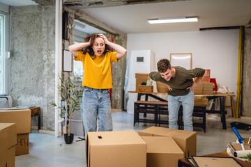 Nervous woman gets angry at man for messing up boxes