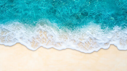 Obraz premium Crystal-clear water meets sandy ocean floor with gentle waves and bright blue backdrop