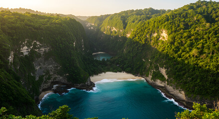 Hidden Beach Cove Surrounded by Lush Greenery Aerial View