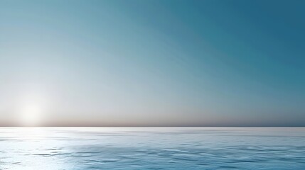 Obraz premium Calm Seascape at Sunrise with Soft Blue Tones and Reflective Waters for Tranquil Moments