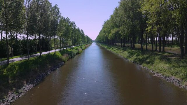 Scenic View of Leopold Canal with Lush Greenery