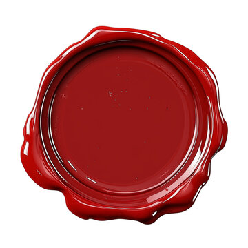 Wax seal in vibrant red color on flat surface