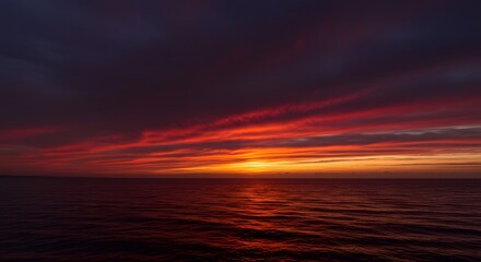 Fototapeta premium Dramatic sky with colorful gradient over water a scenic sunset or sunrise
