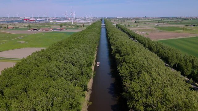 Tranquil Waters of Leopold Canal in a Lush Green Setting