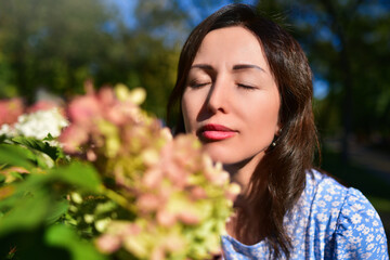 Close-up Portrait of Peaceful Woman Enjoying Nature Outdoors